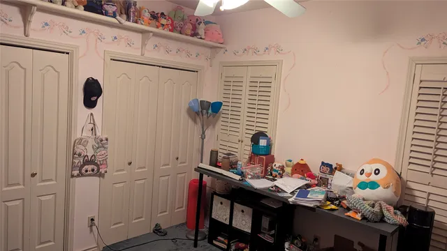 a room with furniture and musical instruments