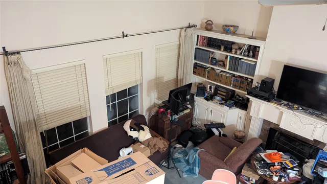 a kitchen with a sink appliances and cabinets