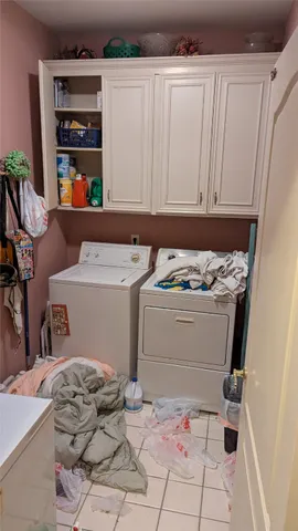 a bathroom with a bathtub and mirror