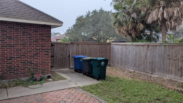 a backyard of a house with outdoor seating