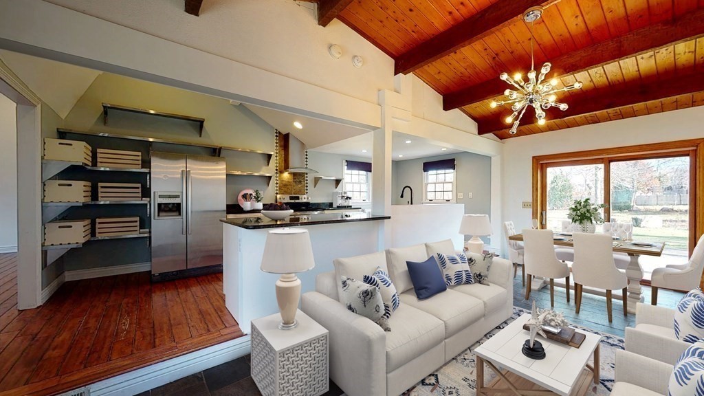 6 Egypt Beach Road Scituate, MA 02066 - Photo 1 of 29 a living room with fireplace furniture and a wooden floor