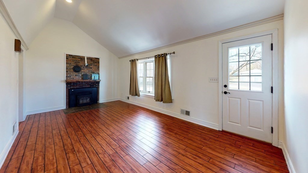6 Egypt Beach Road Scituate, MA 02066 - Photo 19 of 29 a view of an empty room with wooden floor and a window