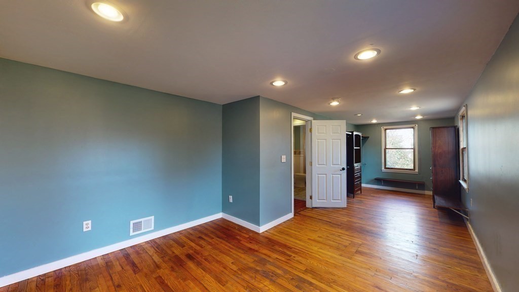 6 Egypt Beach Road Scituate, MA 02066 - Photo 21 of 29 a view of empty room with wooden floor