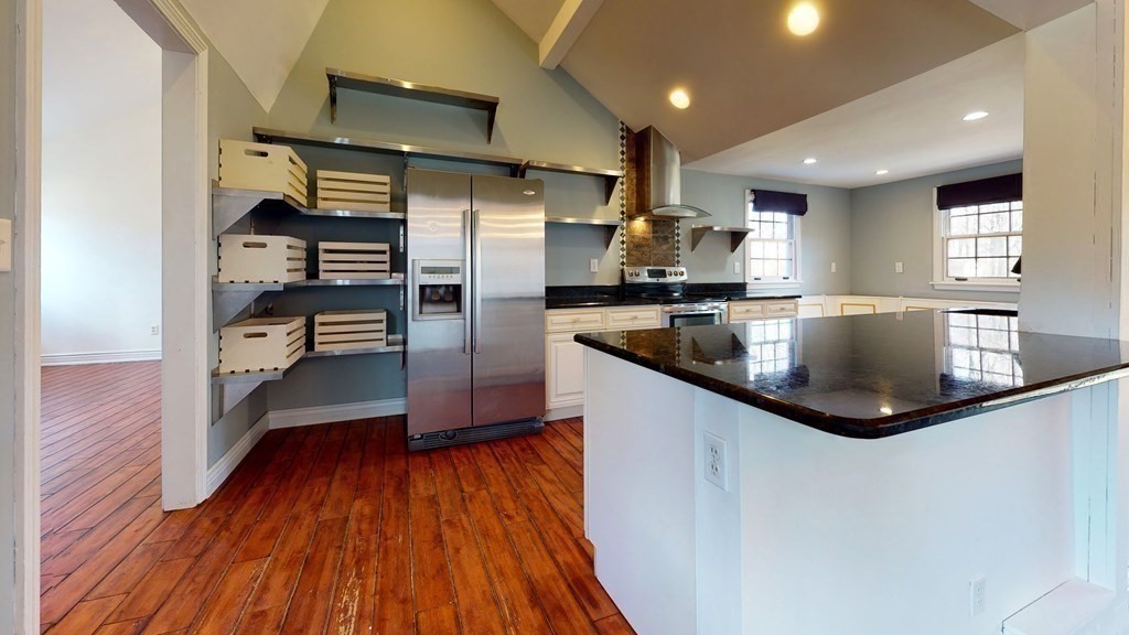6 Egypt Beach Road Scituate, MA 02066 - Photo 4 of 29 a kitchen with stainless steel appliances granite countertop a refrigerator and a sink