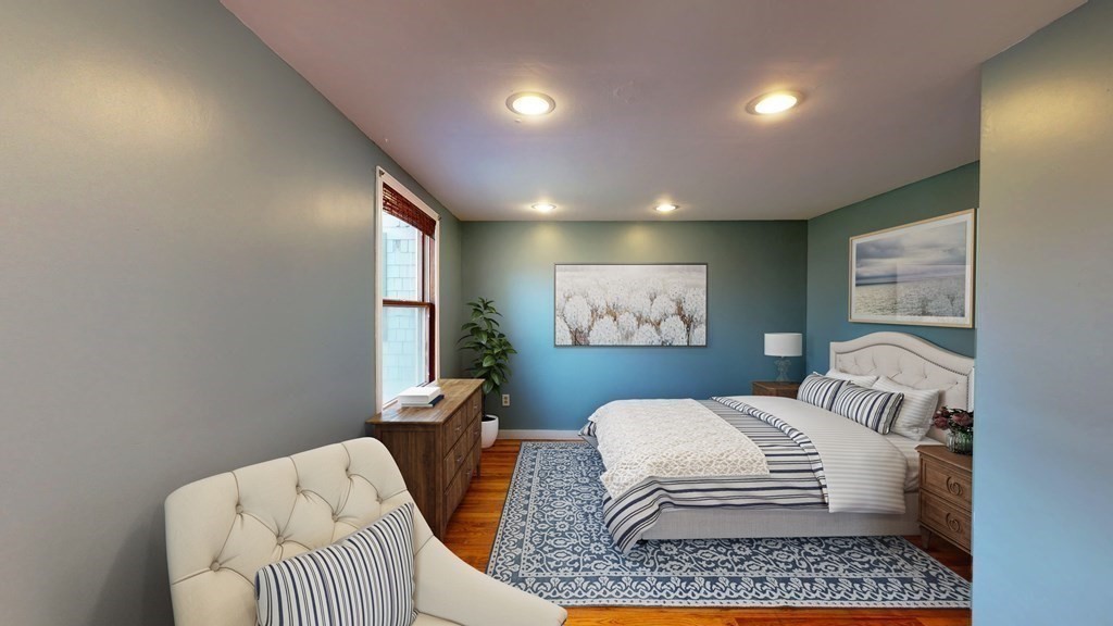 6 Egypt Beach Road Scituate, MA 02066 - Photo 7 of 29 a living room with furniture and a rug