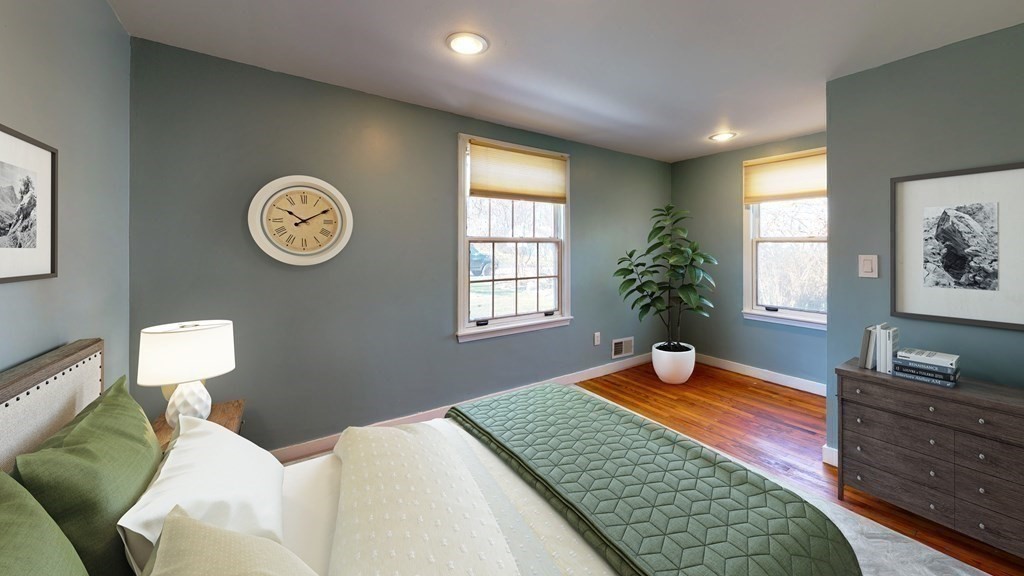 6 Egypt Beach Road Scituate, MA 02066 - Photo 8 of 29 a bedroom with a bed and a window