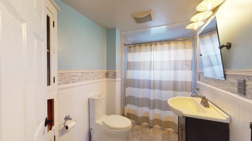 6 Egypt Beach Road Scituate, MA 02066 - Photo 9 of 29 a bathroom with a sink toilet and shower
