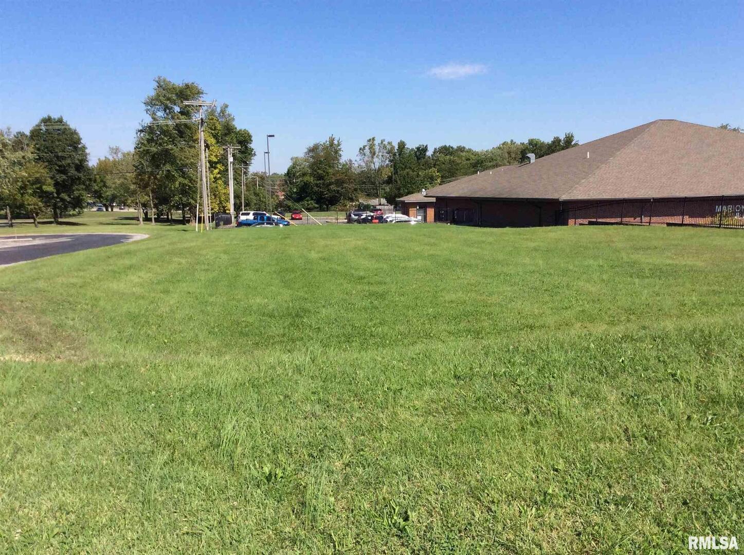 2906 Broadway Street Mount Vernon, IL 62864 - Photo 4 of 12 a view of grassy field with mountain