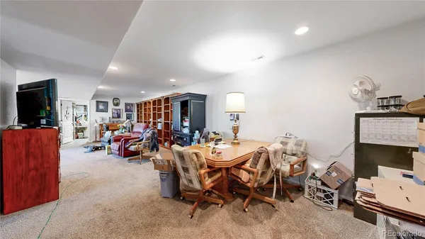 a view of a livingroom with furniture and a livingroom