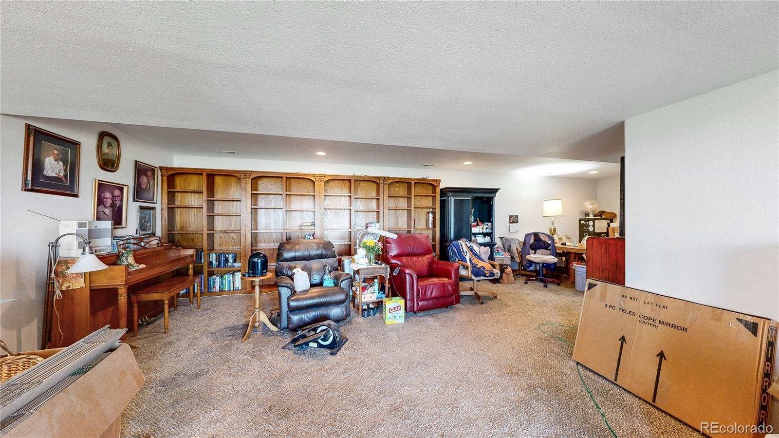 40291 Gold Nugget Road Deer Trail, CO 80105 - Photo 29 of 47 a living room with furniture and a large window