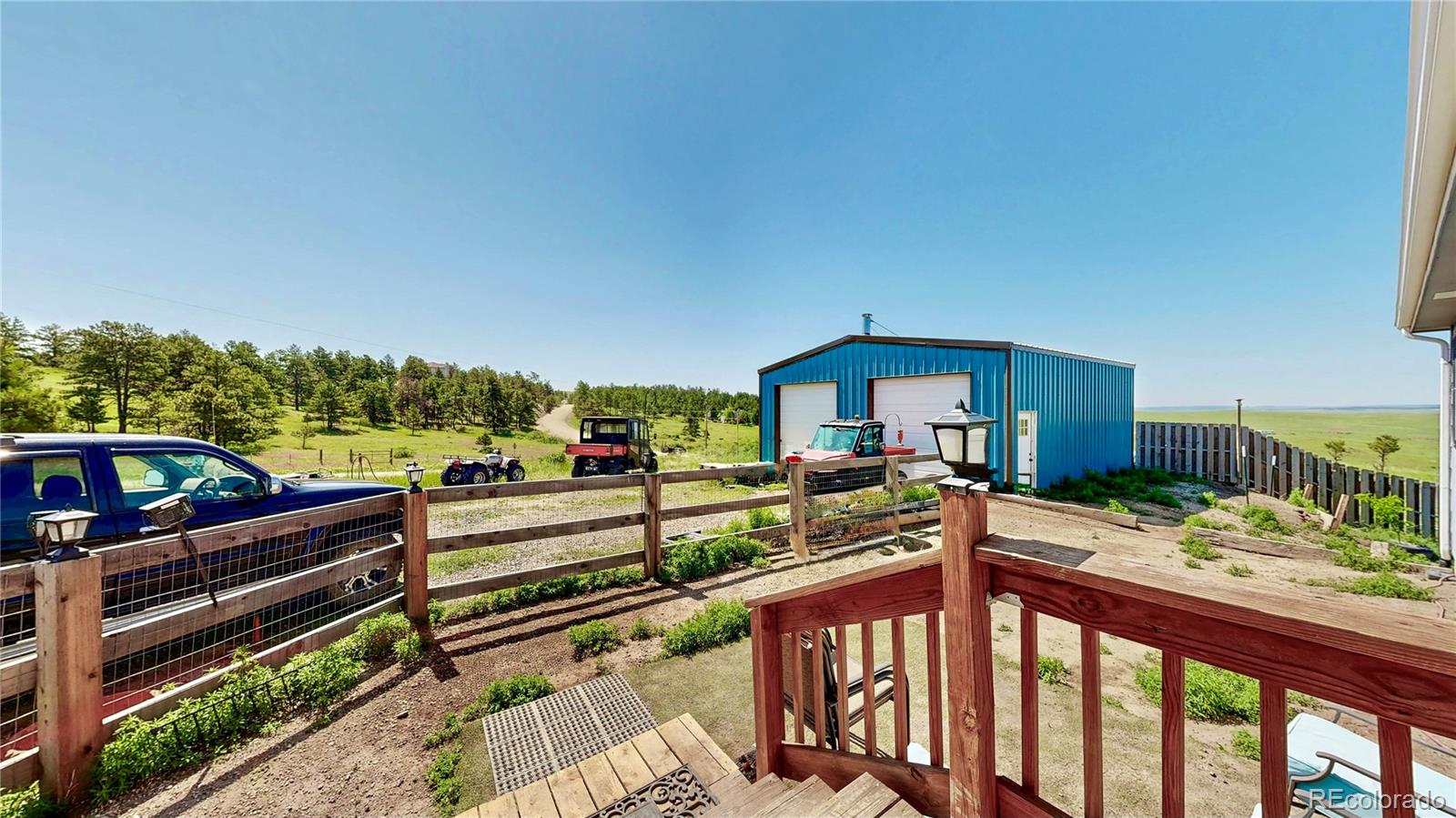 40291 Gold Nugget Road Deer Trail, CO 80105 - Photo 39 of 47 a view of a balcony with a patio