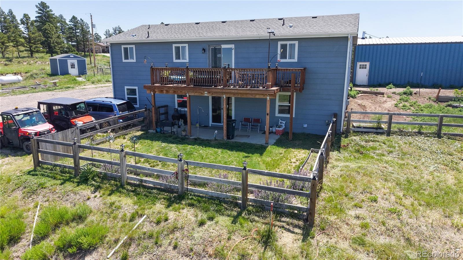 40291 Gold Nugget Road Deer Trail, CO 80105 - Photo 42 of 47 a view of a chairs and table in the patio