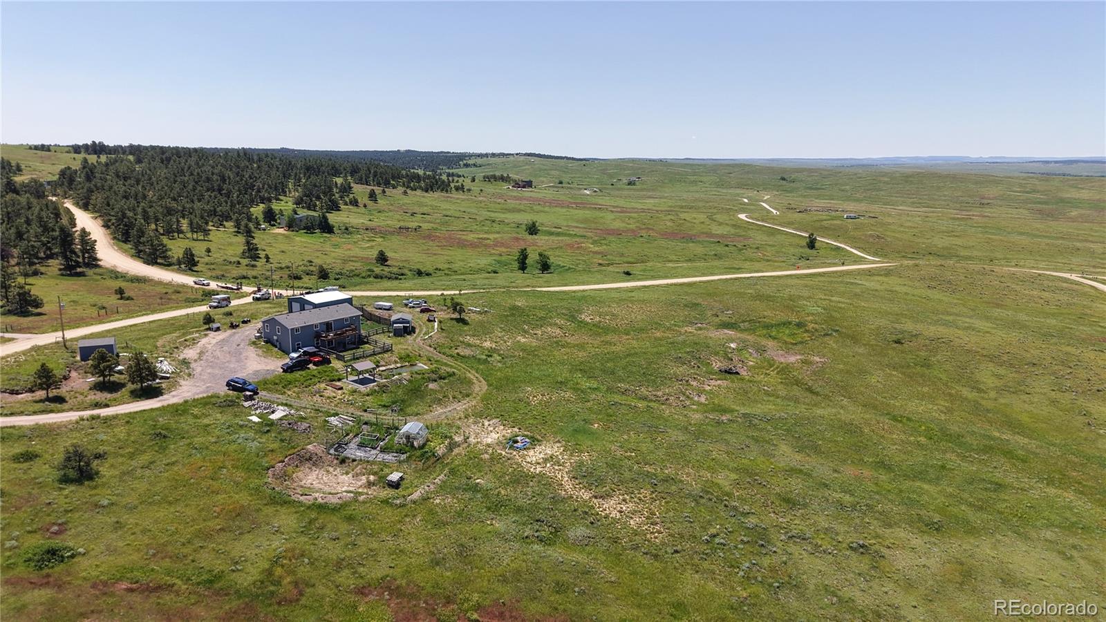40291 Gold Nugget Road Deer Trail, CO 80105 - Photo 46 of 47 a view of an outdoor space and lakeside
