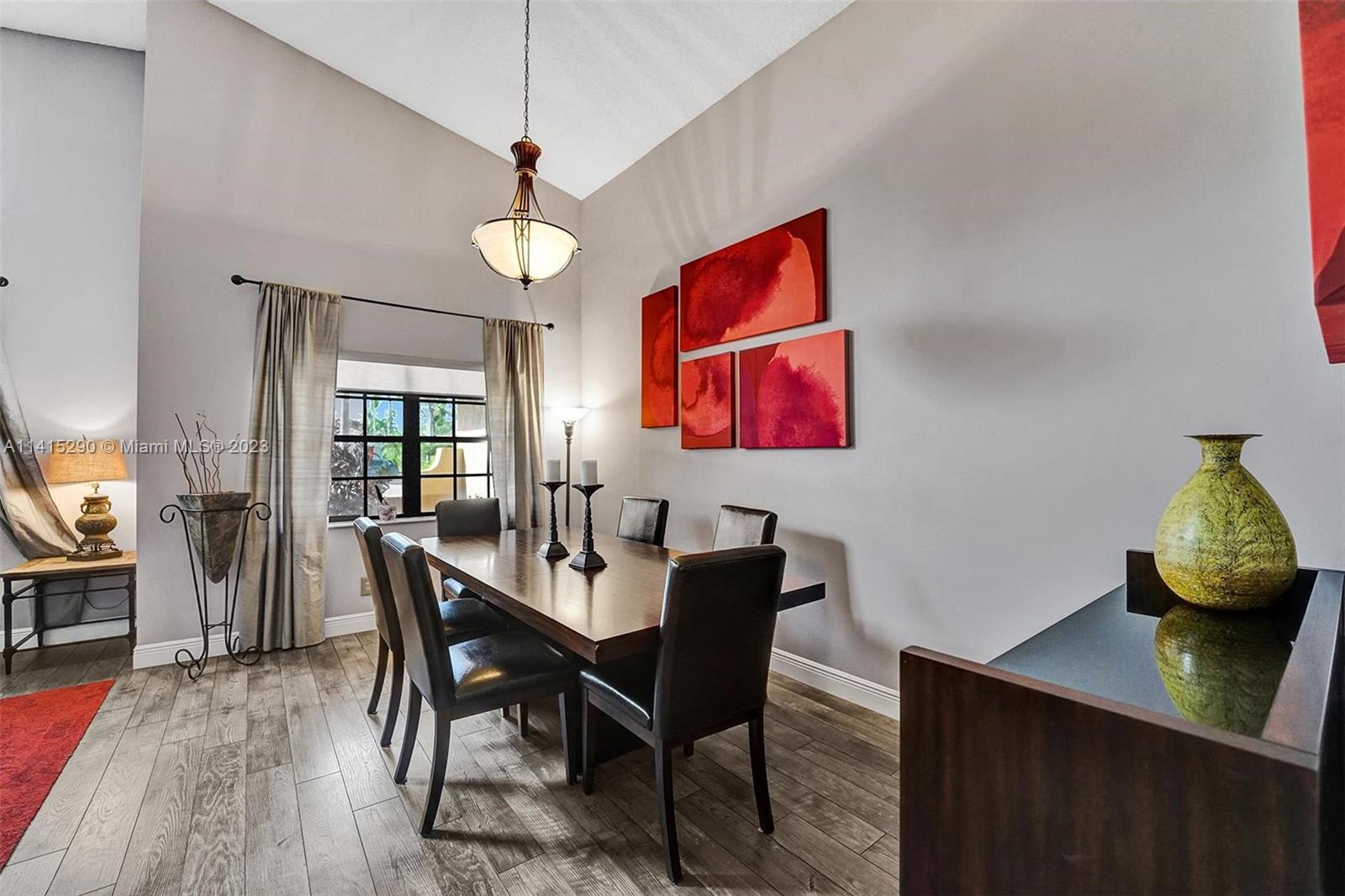 9641 Ridgeside Court Davie, FL 33328 - Photo 15 of 78 a dining room with furniture and window