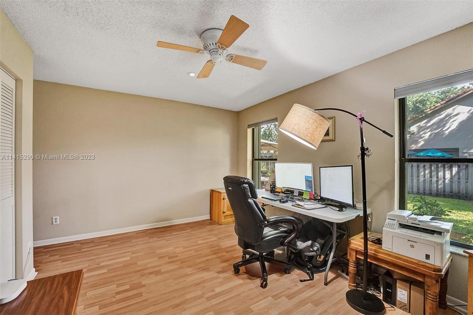 9641 Ridgeside Court Davie, FL 33328 - Photo 37 of 78 a workspace with furniture and window