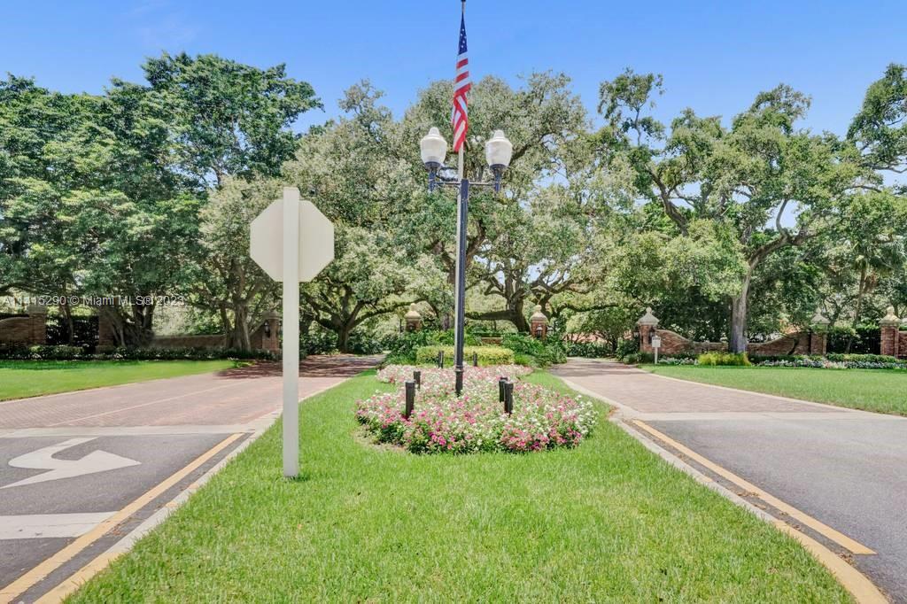 9641 Ridgeside Court Davie, FL 33328 - Photo 74 of 78 a front view of a house with a yard