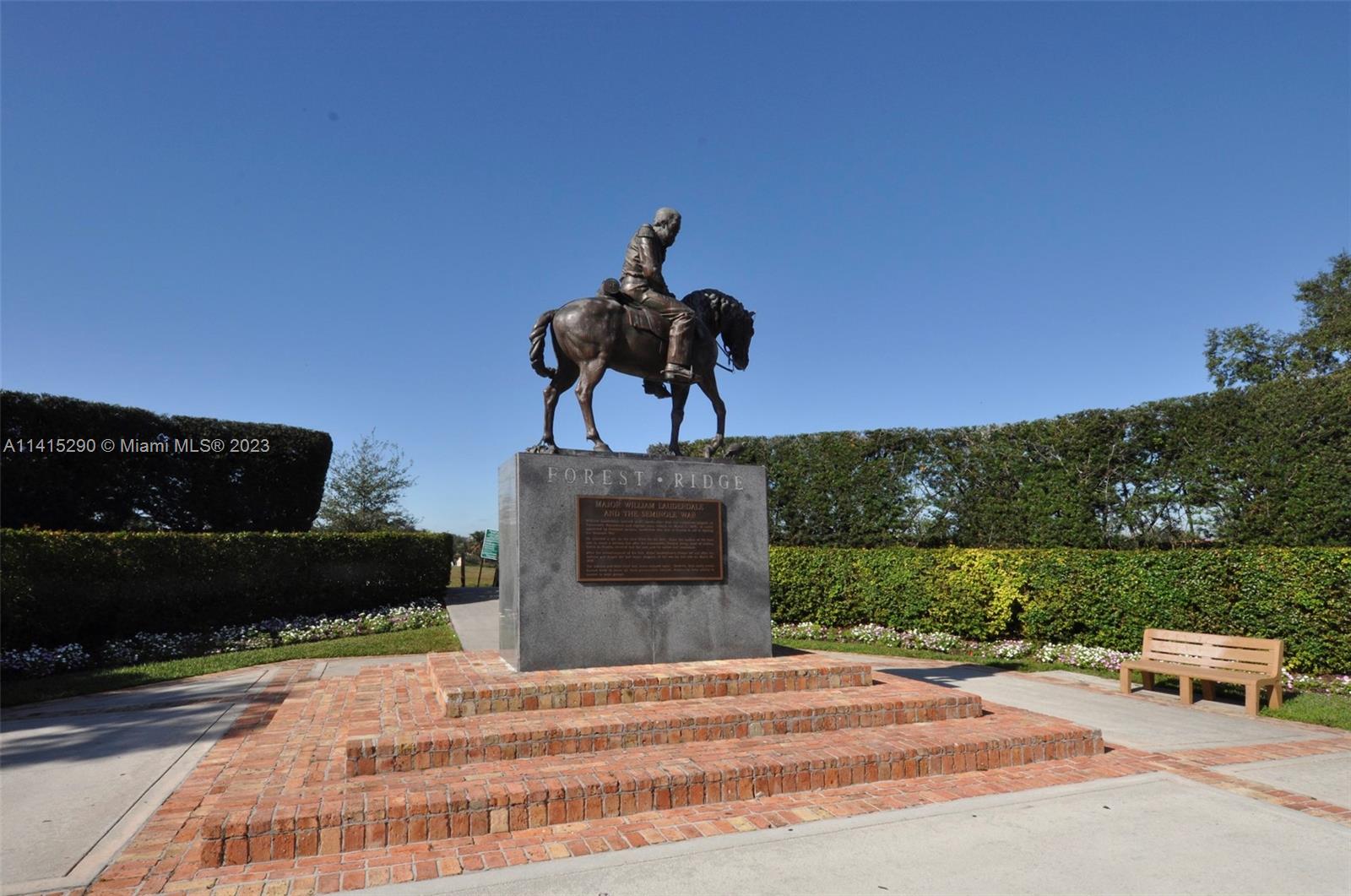 9641 Ridgeside Court Davie, FL 33328 - Photo 78 of 78 a street view with a garden space