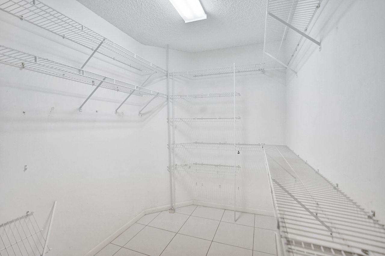 8071 Greenbrook Road, Unit 232C Boca Raton, FL 33496 - Photo 23 of 33 Master Closet