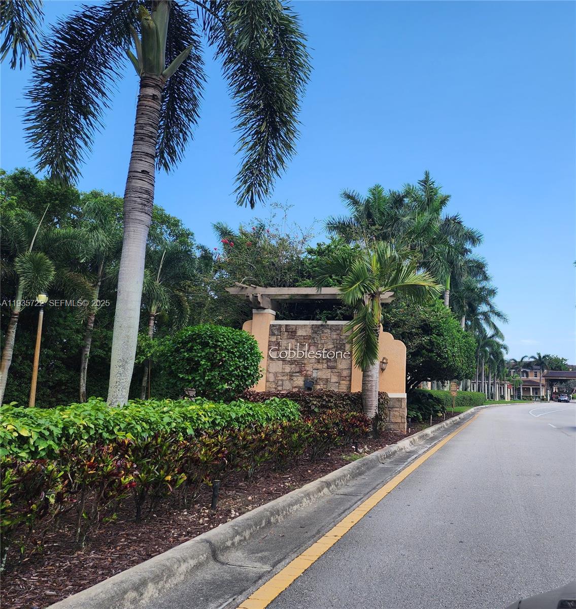 a view of a street with a building in front of it