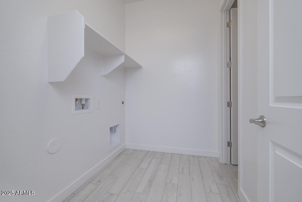 1982 East Empeltre Road San Tan Valley, AZ 85140 - Photo 6 of 18 Tri Pointe Soleo 328 - Laundry-1MLS