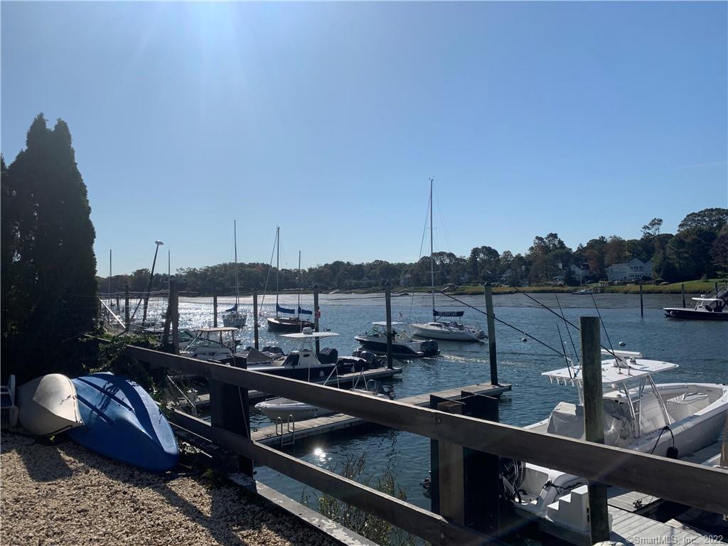 135 Rowayton Avenue, Unit E Norwalk, CT 06853 - Photo 1 of 1 a view of a lake from a balcony