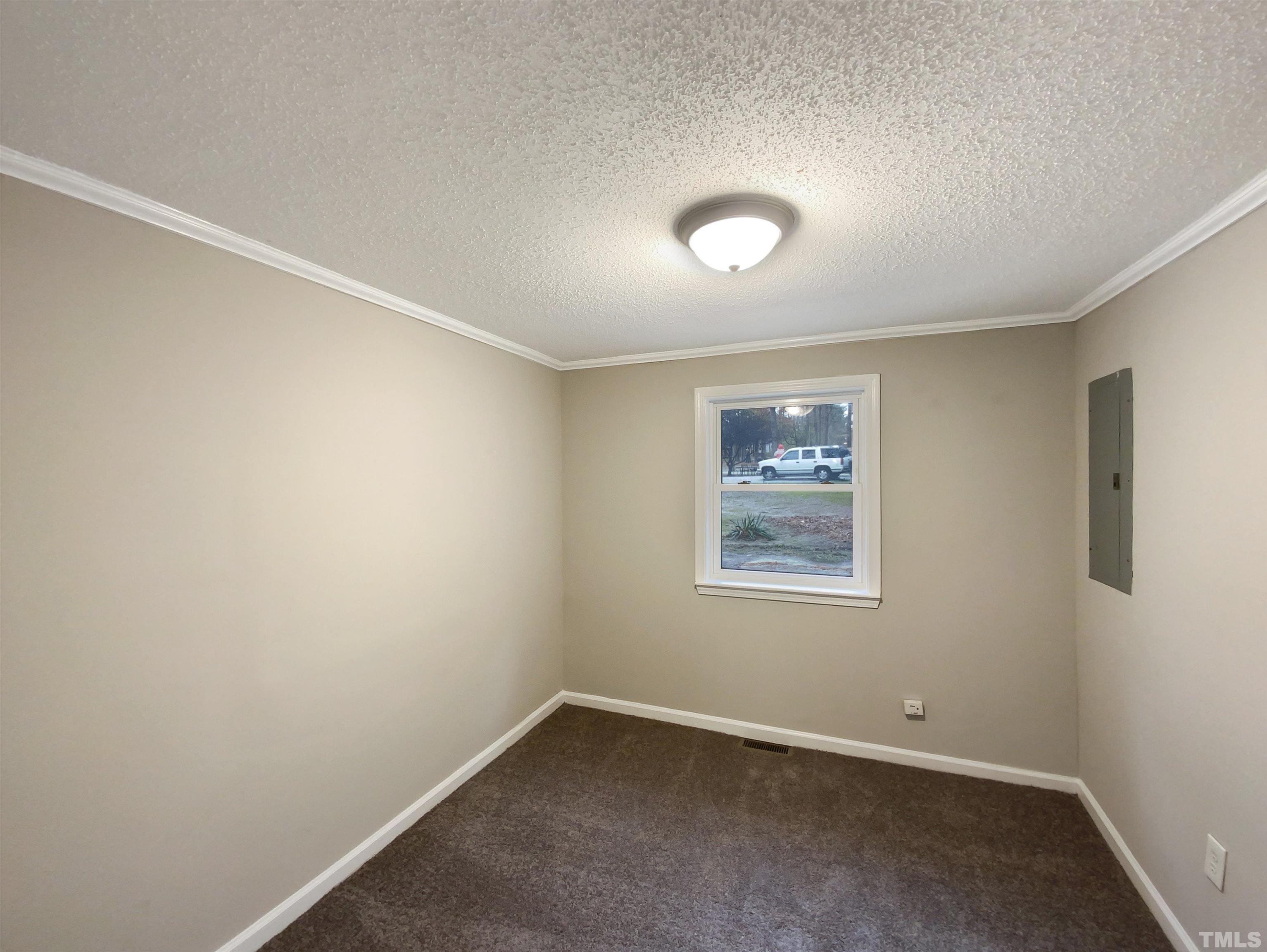 1521 Wiljohn Road Garner, NC 27529 - Photo 12 of 20 an empty room with a window