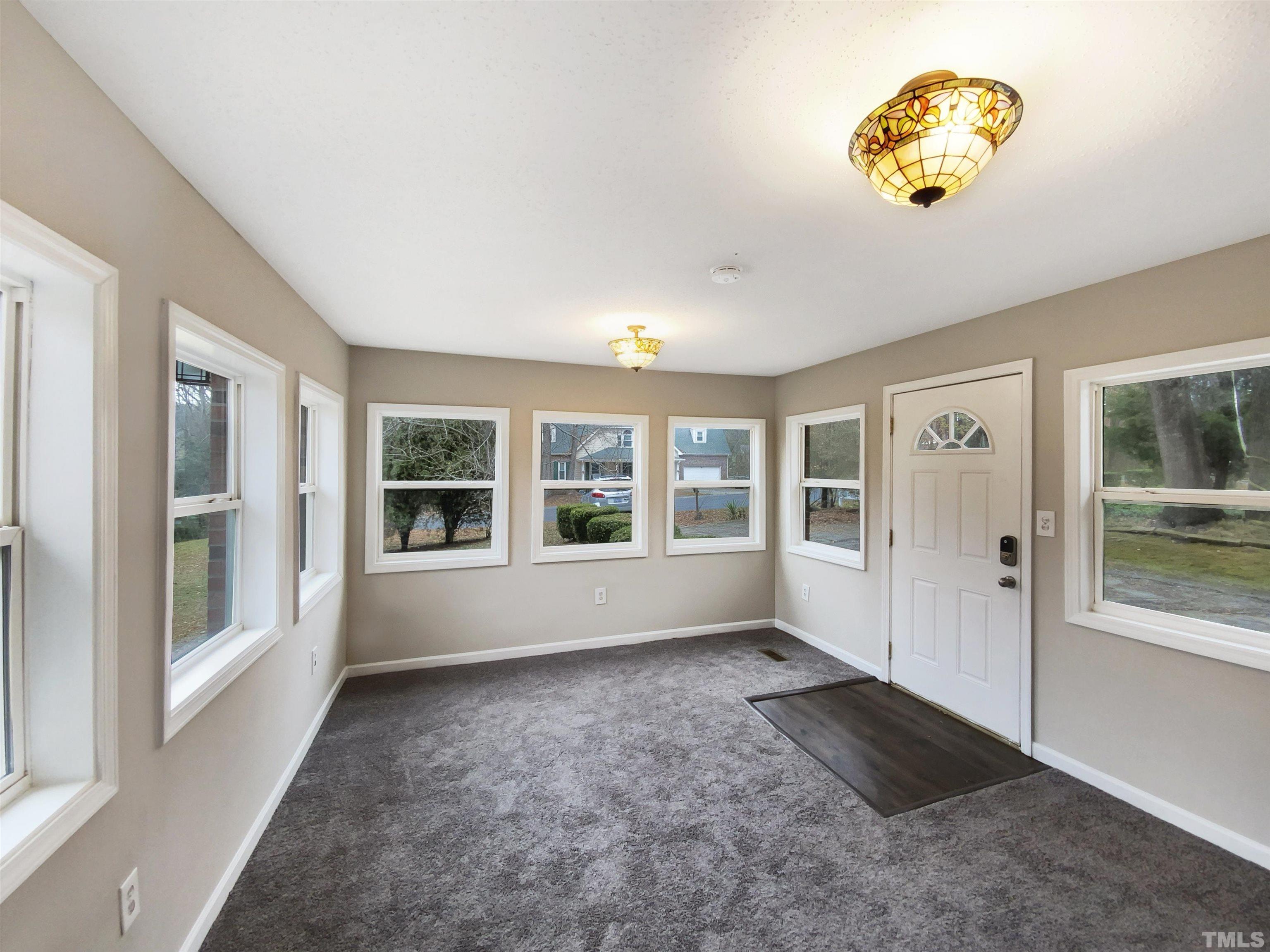 1521 Wiljohn Road Garner, NC 27529 - Photo 14 of 20 a view of an empty room with a window
