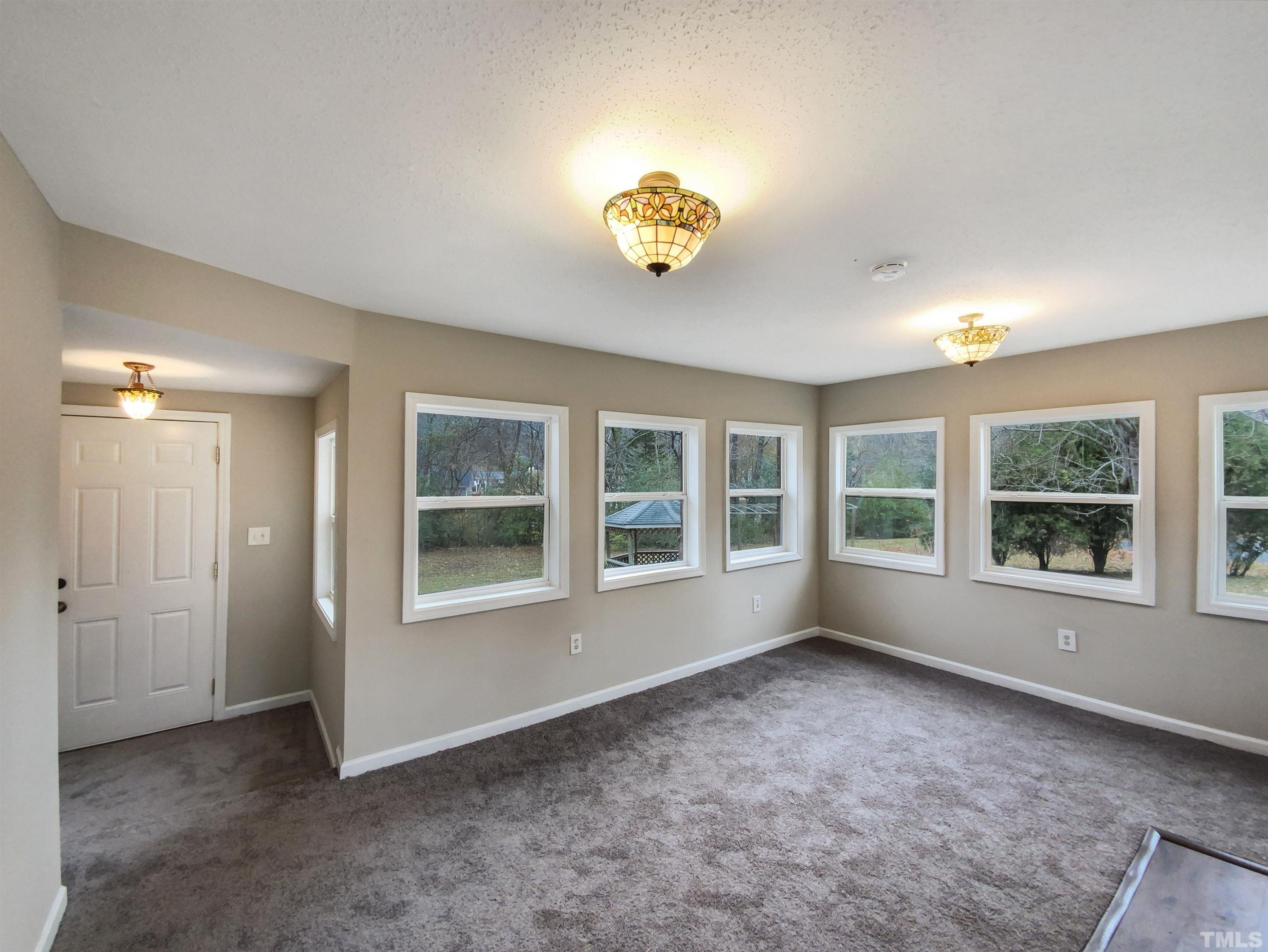 1521 Wiljohn Road Garner, NC 27529 - Photo 15 of 20 an empty room with a window