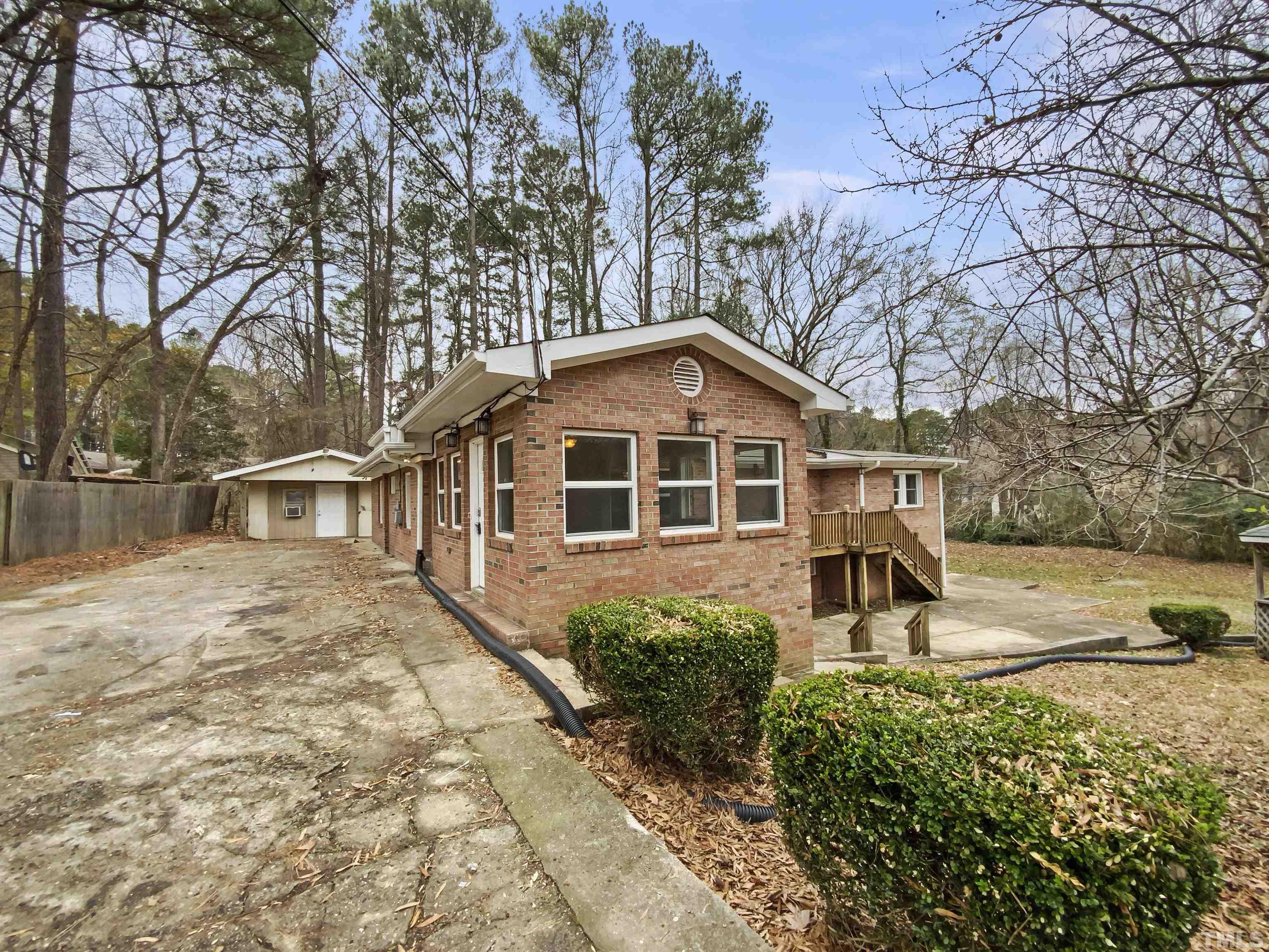 1521 Wiljohn Road Garner, NC 27529 - Photo 19 of 20 a front view of a house with a yard