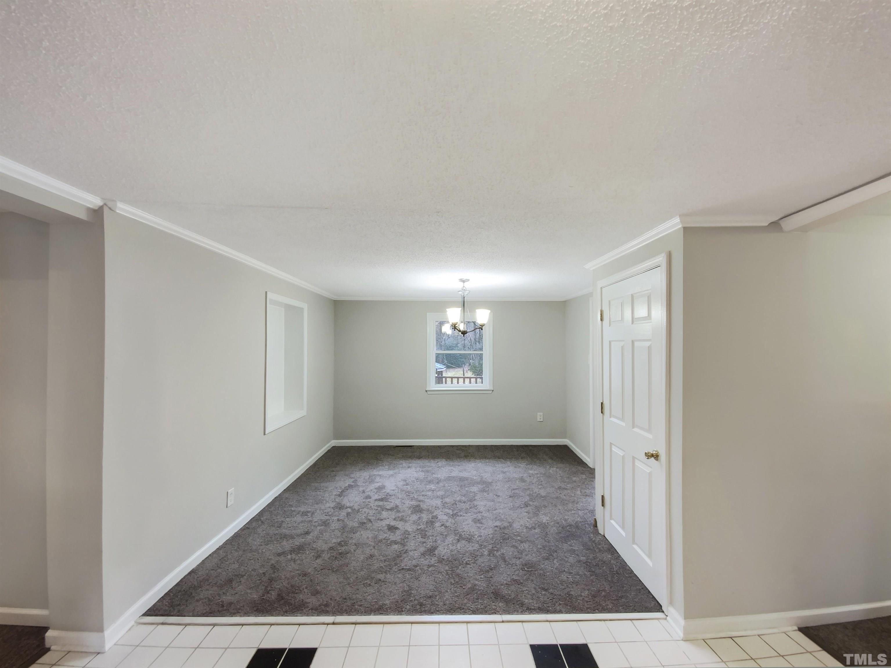 1521 Wiljohn Road Garner, NC 27529 - Photo 4 of 20 an empty room with windows