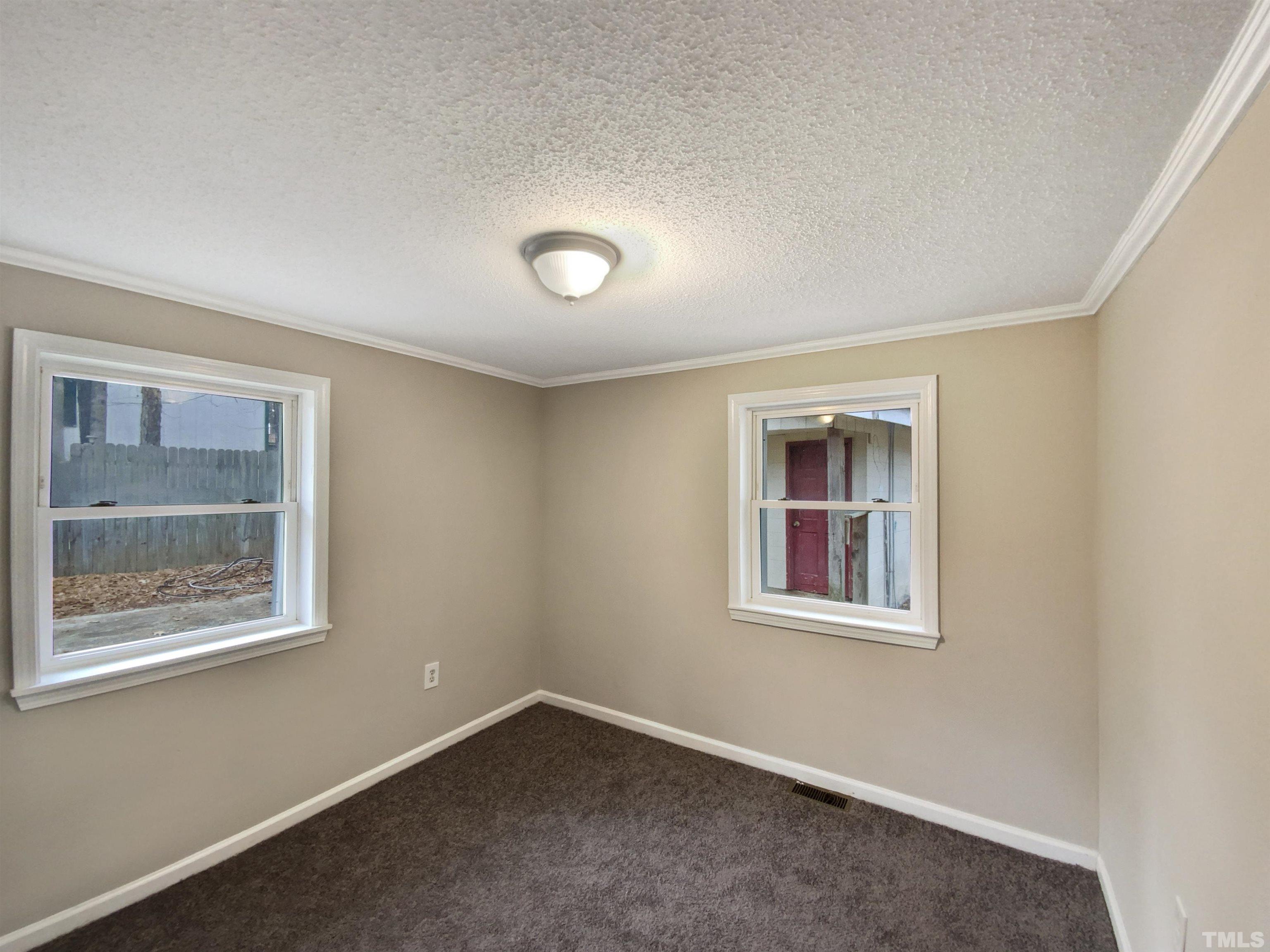 1521 Wiljohn Road Garner, NC 27529 - Photo 10 of 20 an empty room with a window