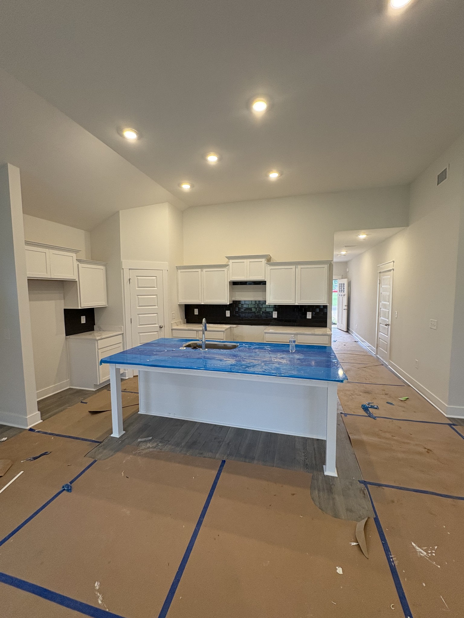 5572 Rooker Road Smyrna, TN 37167 - Photo 11 of 26 a view of a kitchen with kitchen island a sink stainless steel appliances and cabinets