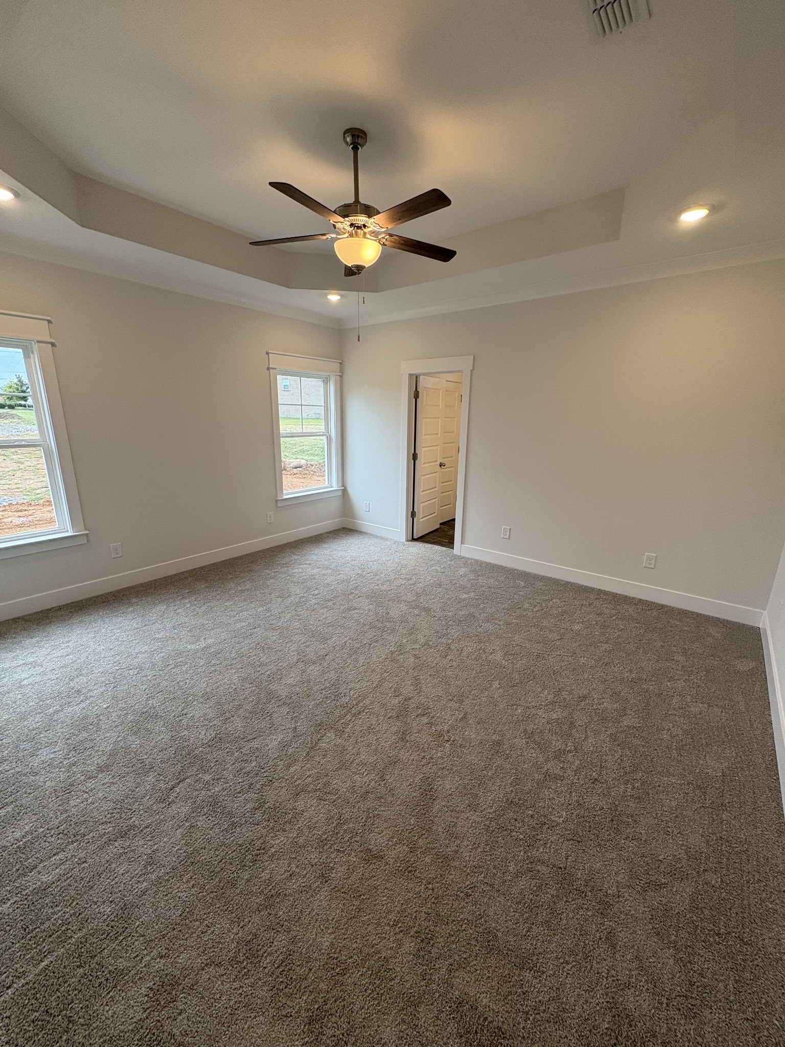 5572 Rooker Road Smyrna, TN 37167 - Photo 16 of 26 an empty room with windows and fan