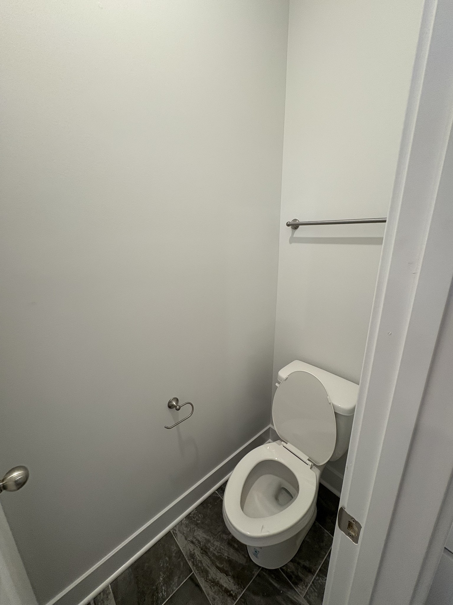 5572 Rooker Road Smyrna, TN 37167 - Photo 23 of 26 a close up of a toilet in a small room
