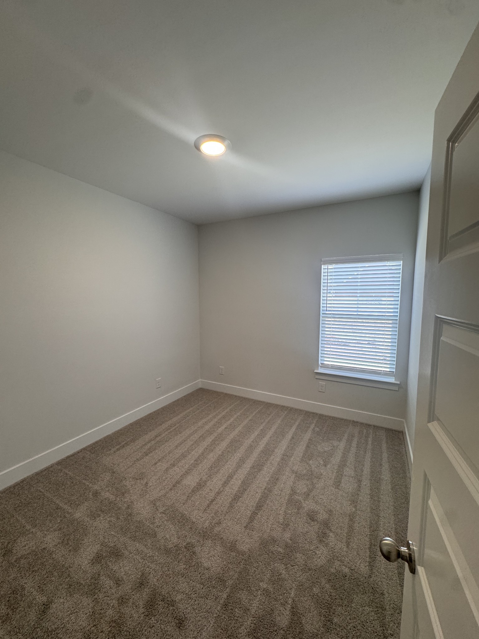 5572 Rooker Road Smyrna, TN 37167 - Photo 7 of 13 an empty room with a window