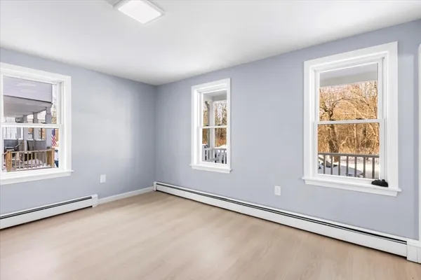 an empty room with windows