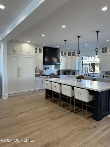 a large kitchen with lots of counter space and appliances