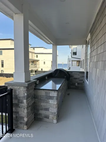 a view of swimming pool with furniture