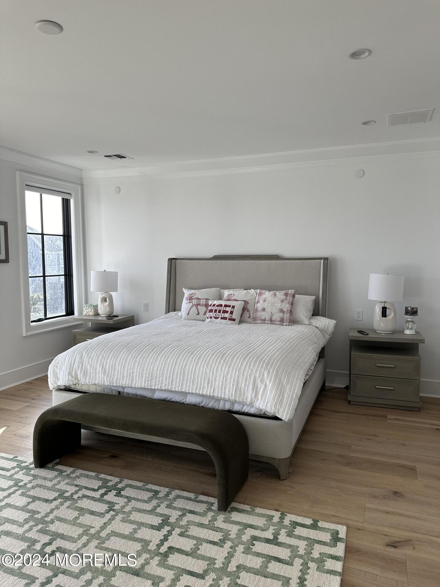 13 Ocean Terrace Long Branch, NJ 07740 - Photo 20 of 49 a bedroom with a bed and a window