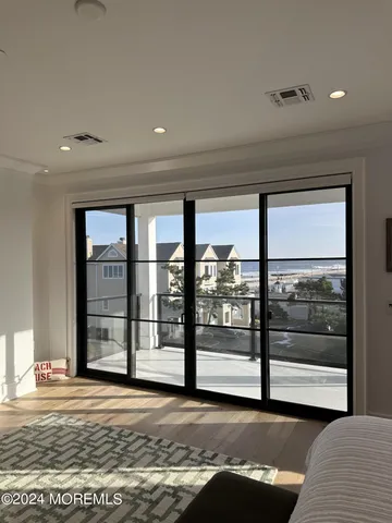 a bathroom with a granite countertop sink mirror and shower