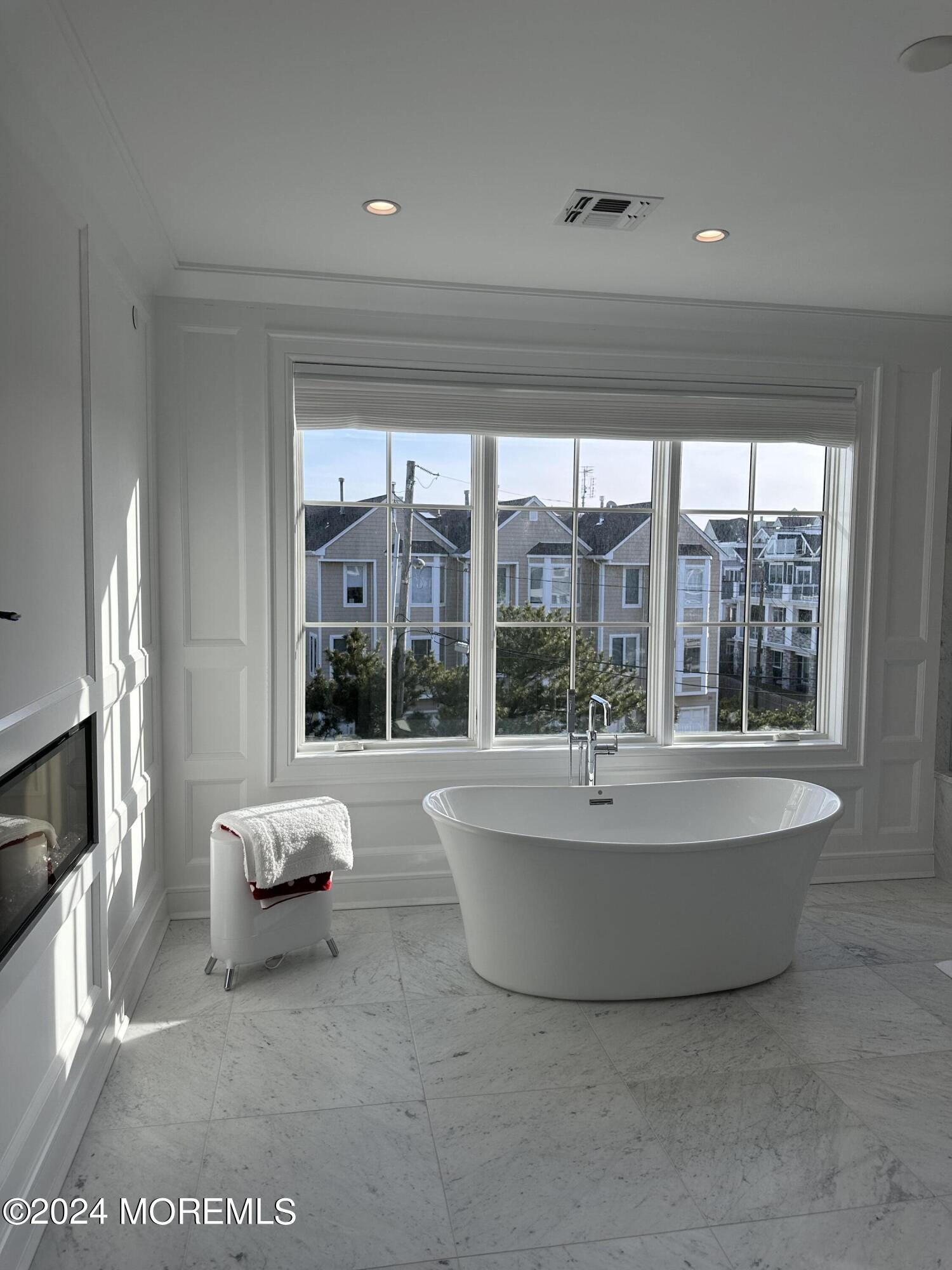 13 Ocean Terrace Long Branch, NJ 07740 - Photo 26 of 49 a living room with furniture and a large window