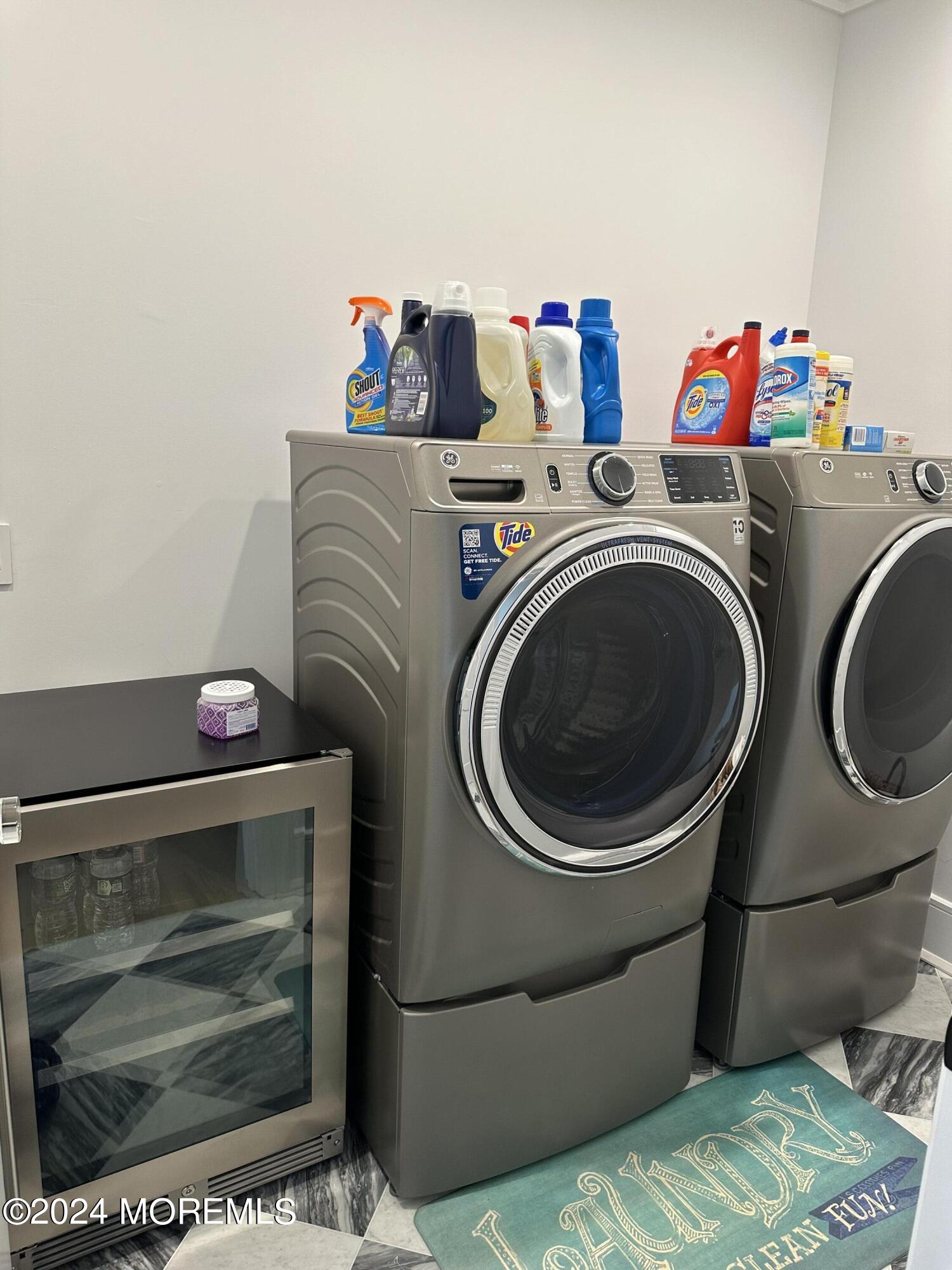 13 Ocean Terrace Long Branch, NJ 07740 - Photo 38 of 49 a utility room with dryer and washer