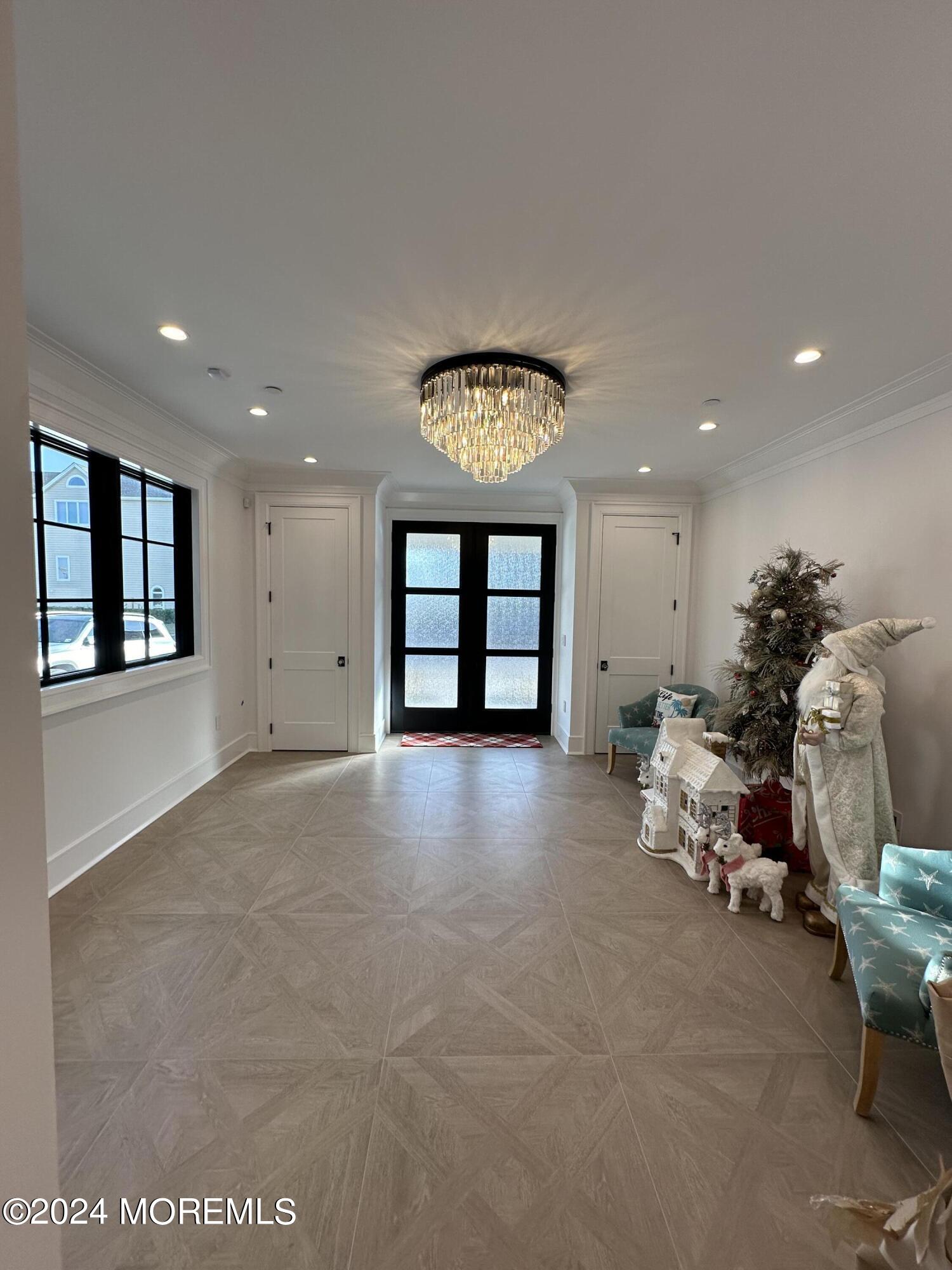 13 Ocean Terrace Long Branch, NJ 07740 - Photo 4 of 49 a view of a livingroom with furniture and windows