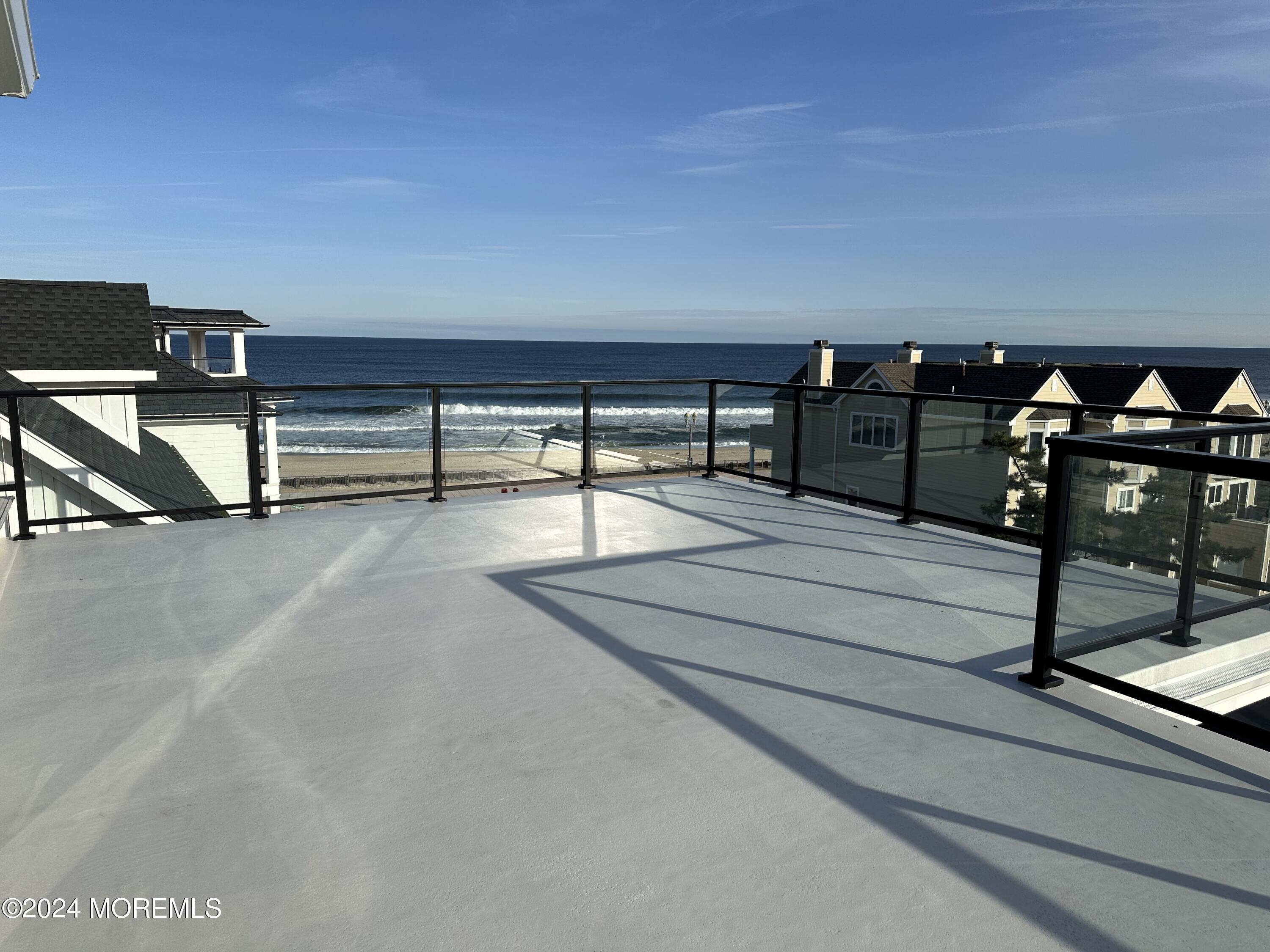 13 Ocean Terrace Long Branch, NJ 07740 - Photo 43 of 49 a view of a terrace with chairs
