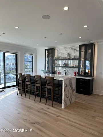 a living room with furniture fireplace and flat screen tv