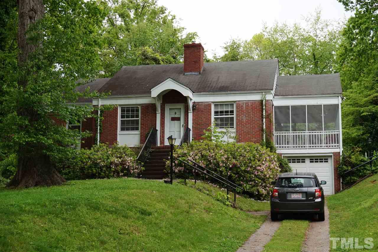 812 Runnymede Road Raleigh, NC 27607 - Photo 1 of 5 a front view of a house with a garden