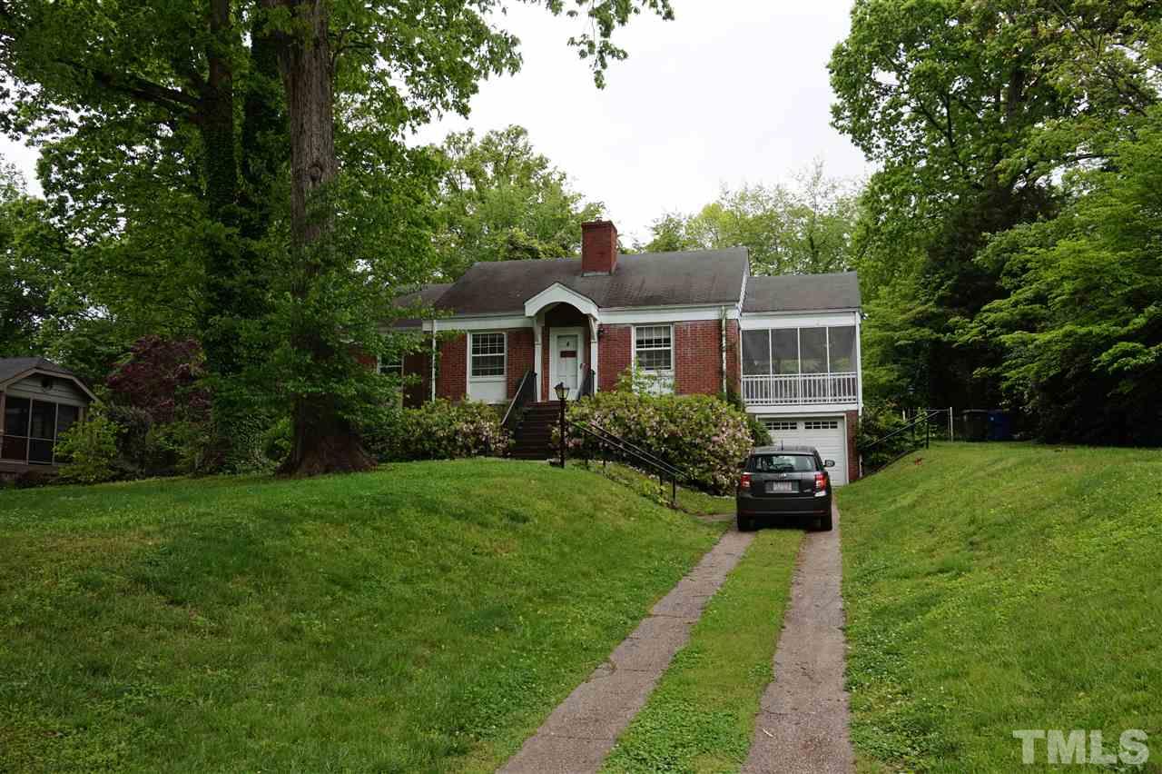 812 Runnymede Road Raleigh, NC 27607 - Photo 2 of 5 a front view of a house with a yard