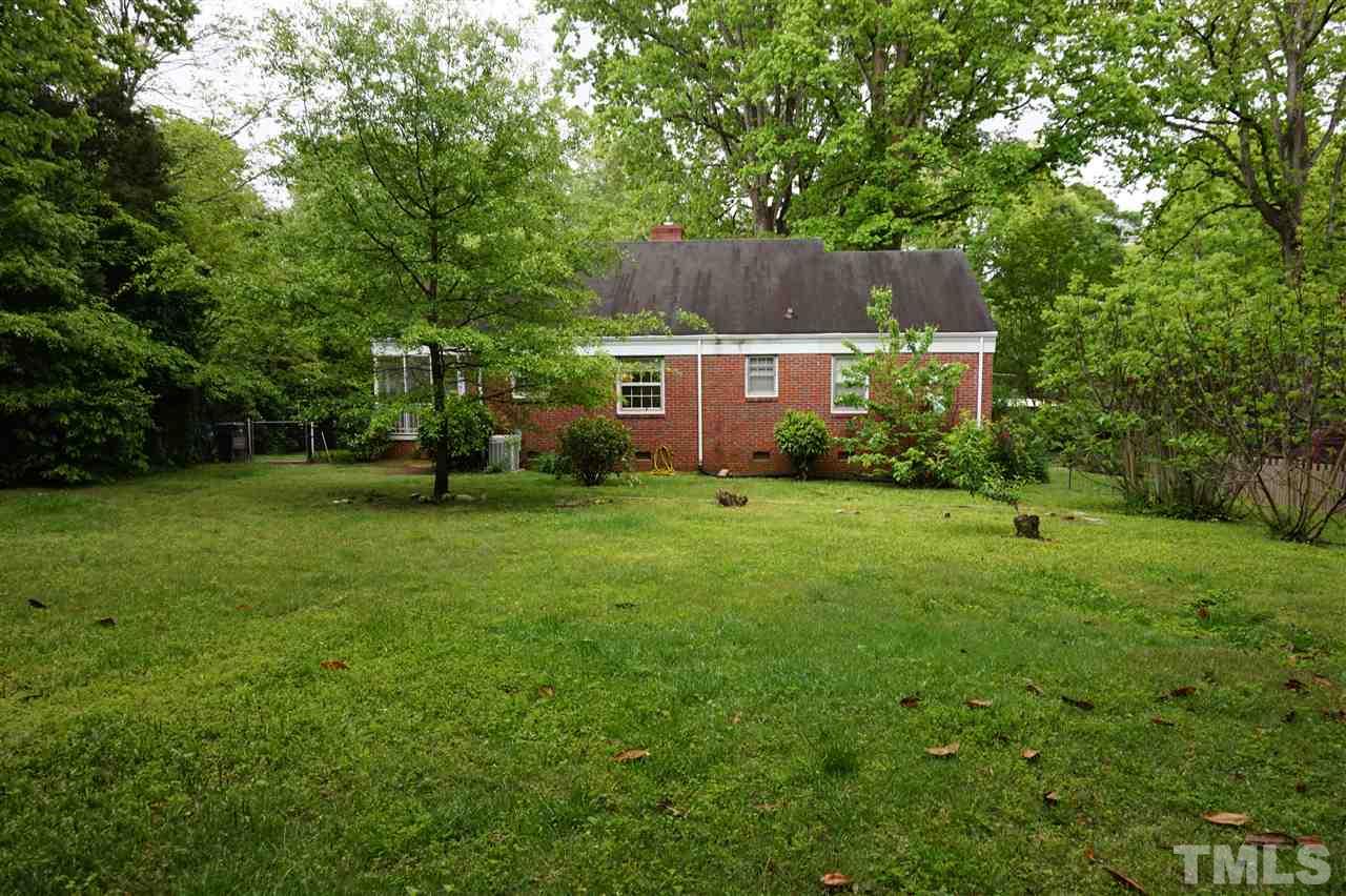 812 Runnymede Road Raleigh, NC 27607 - Photo 5 of 5 a view of an house with backyard space and garden