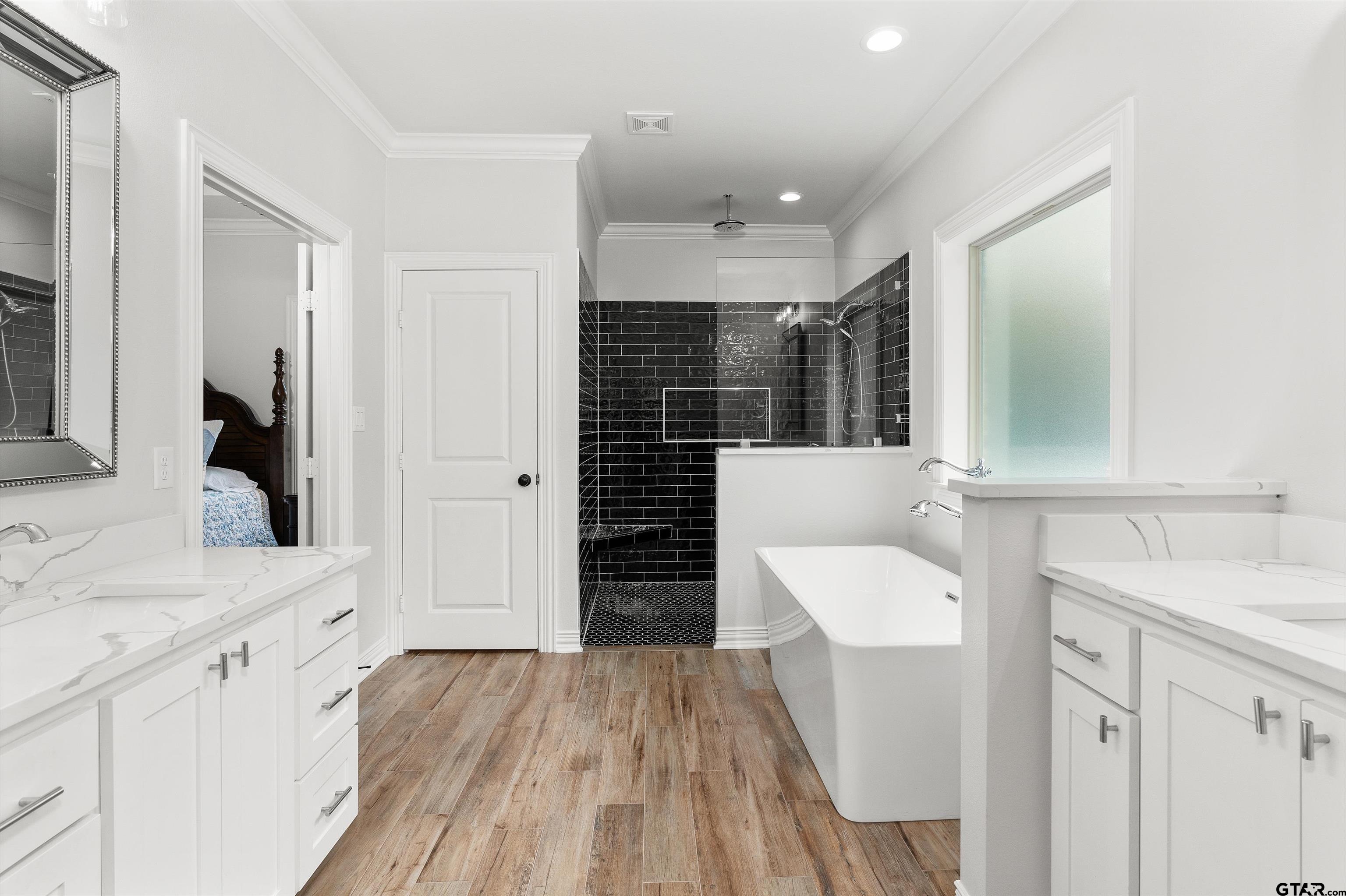 434 King Ranch Road Kilgore, TX 75662 - Photo 26 of 34 a bathroom with a sink and a mirror