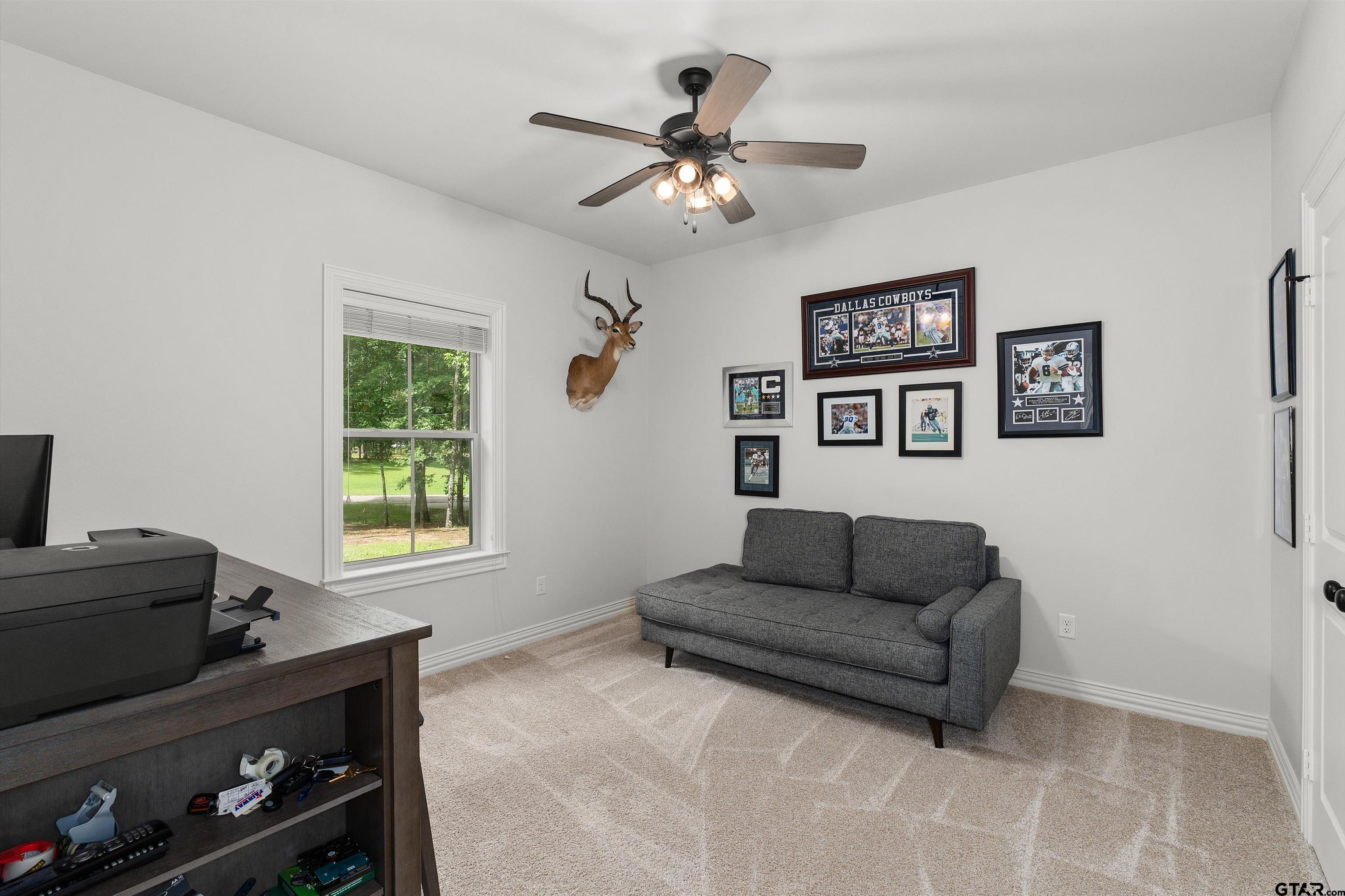 434 King Ranch Road Kilgore, TX 75662 - Photo 33 of 34 a living room with furniture and a window